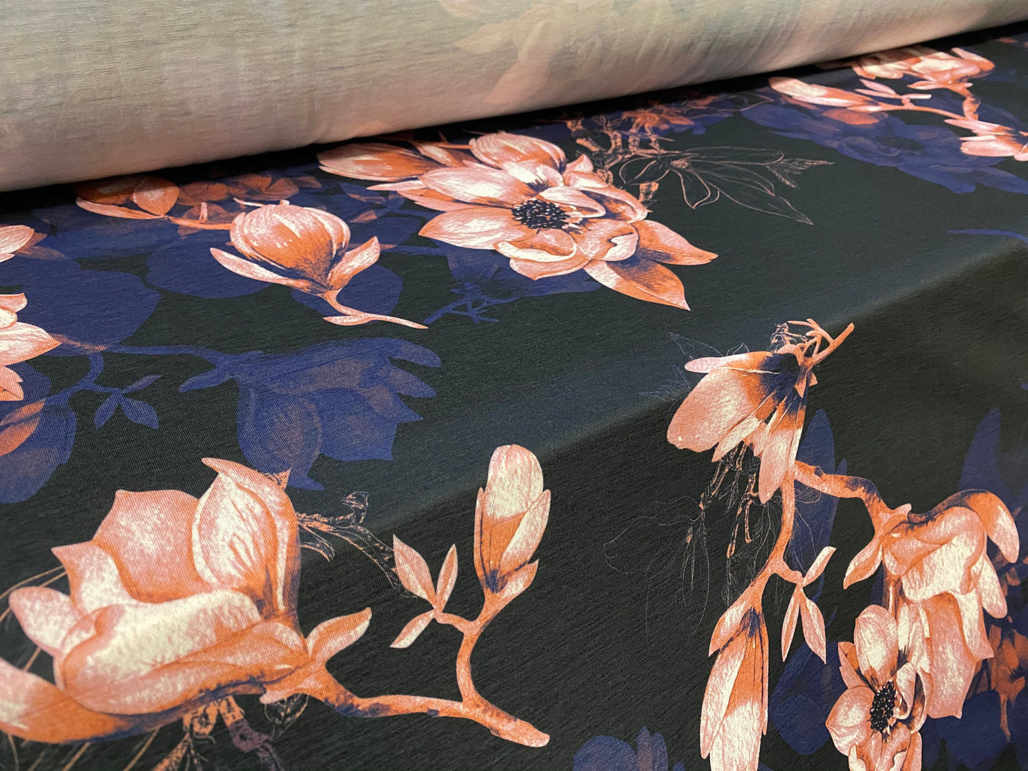 Soft handle single jersey fashion fabric, per metre - flower bud print - navy blue & coral