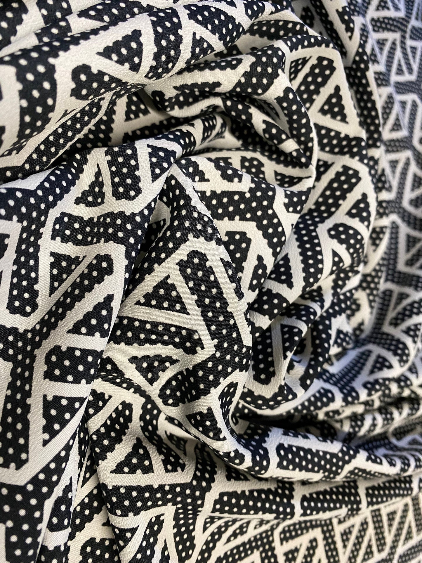 Chirimen woven crepe dress fabric, per metre - black geometric print