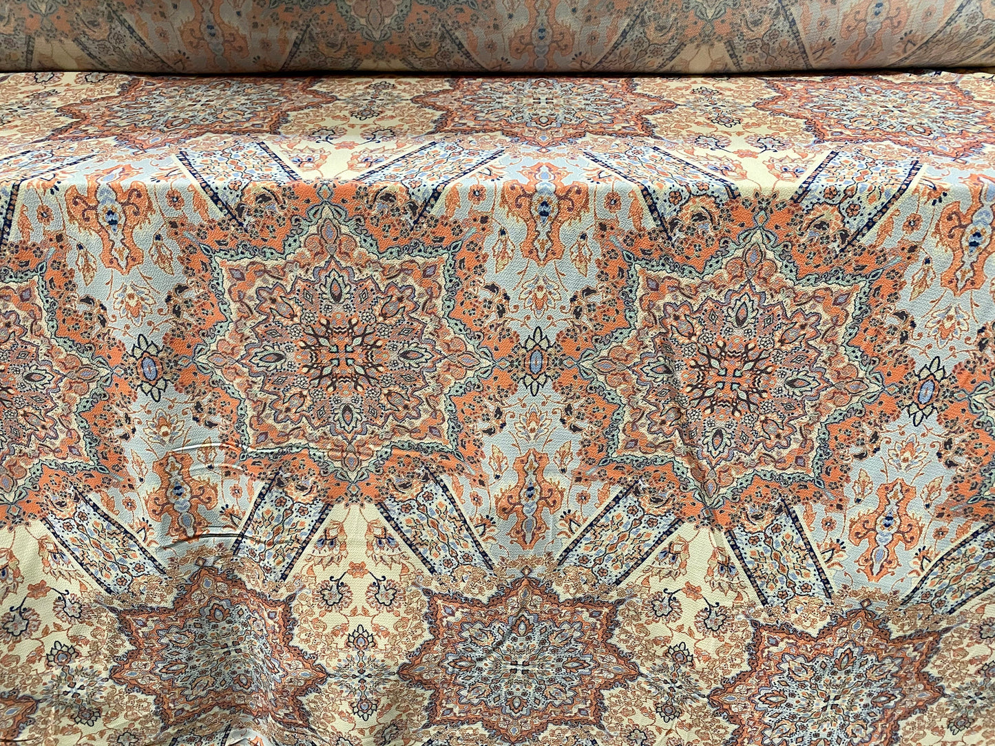 Bubble crepe woven dress fabric with comfort stretch - paisley kaleidoscope print