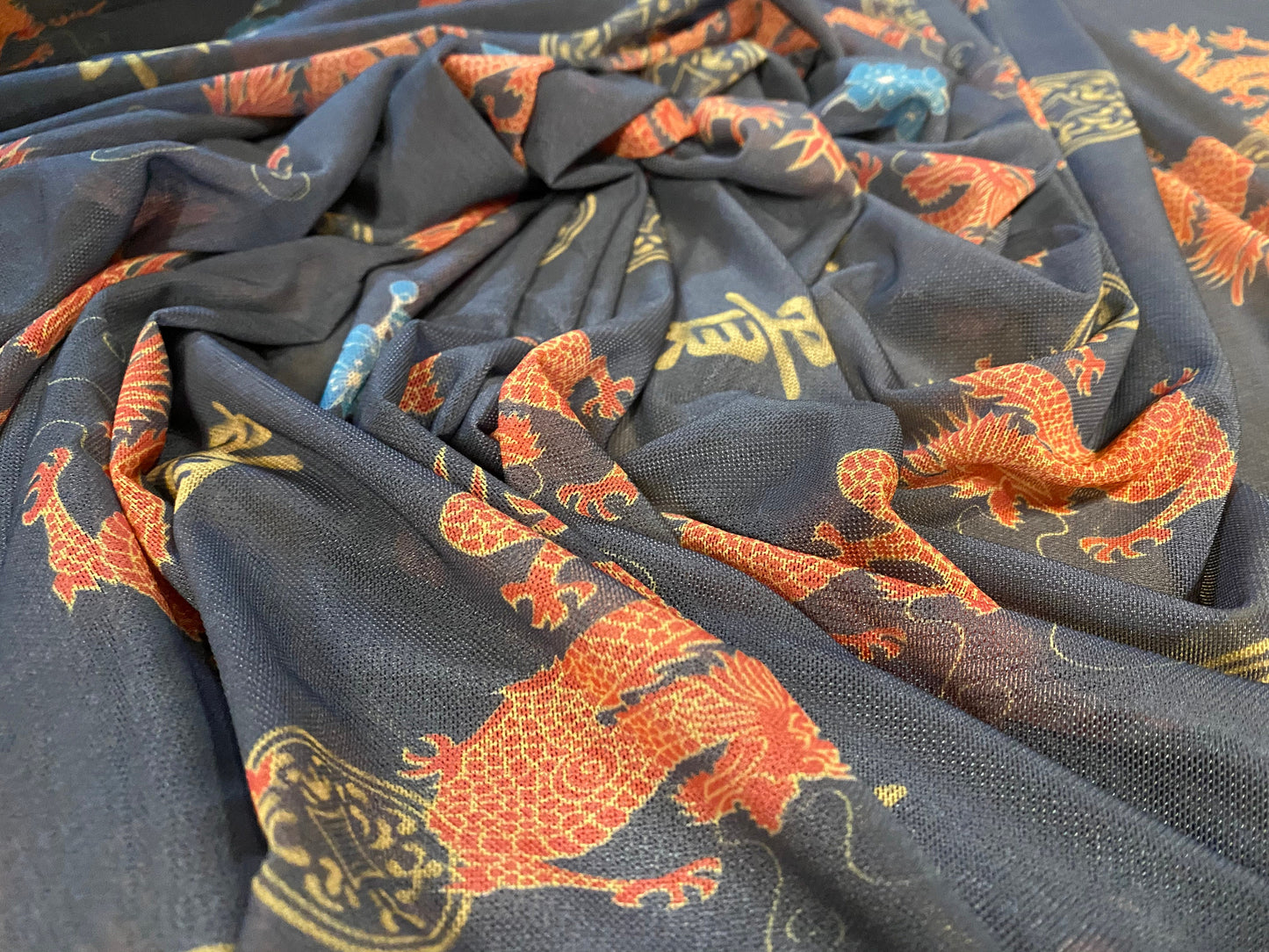 Power mesh net stretch fabric, per metre - oriental dragons print