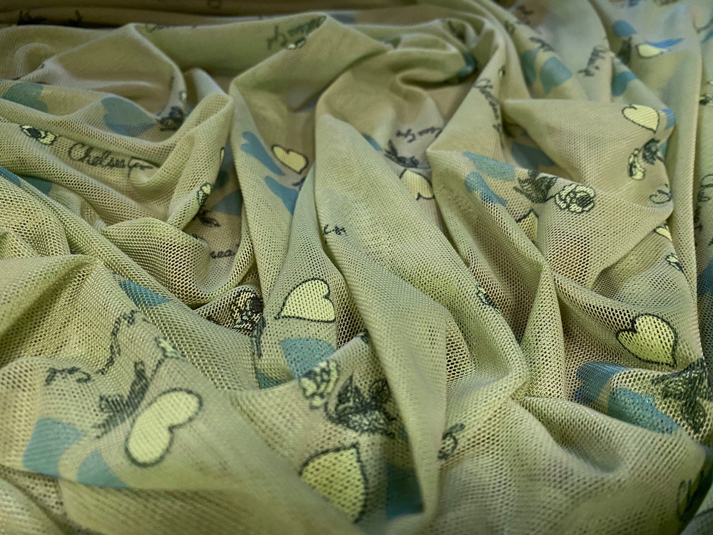 Power mesh net stretch fabric, per metre - Chelsea girl love heart rose tattoo print