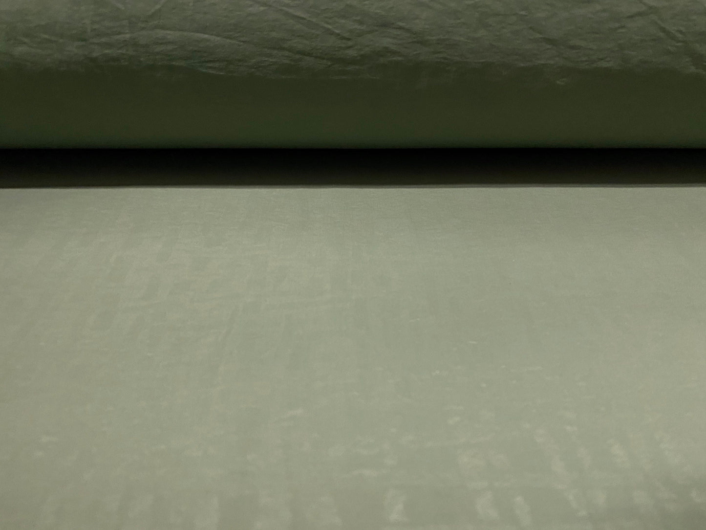 Woven powder touch dress fabric, per metre - khaki geometric print