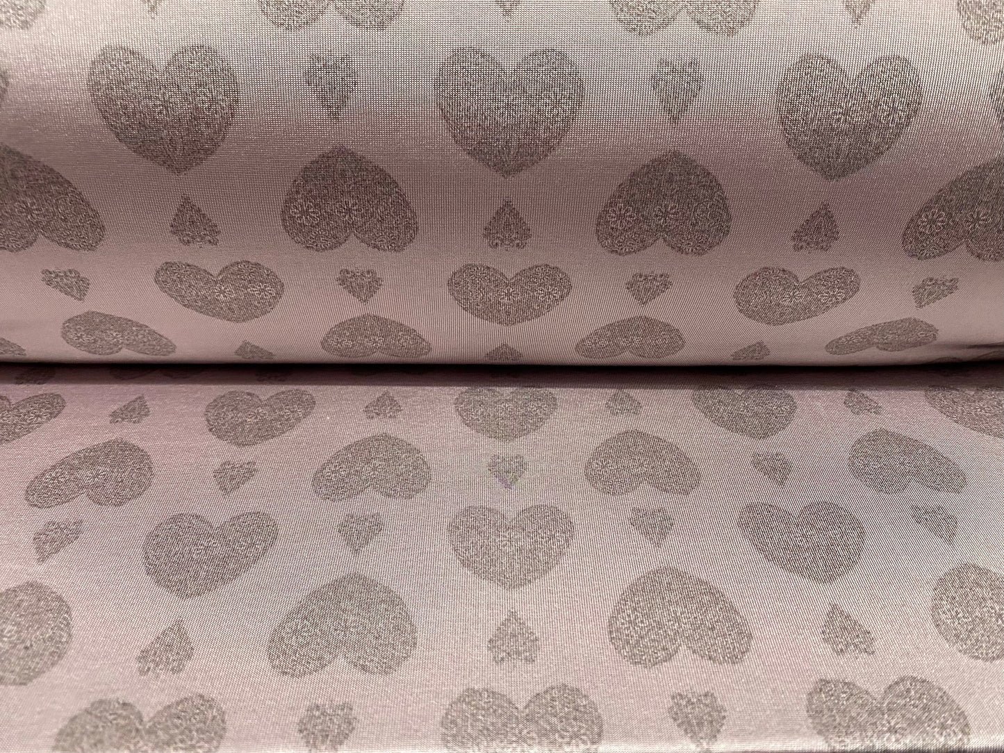 Disco shimmer stretch jersey fabric, per metre - lilac with grey love heart print