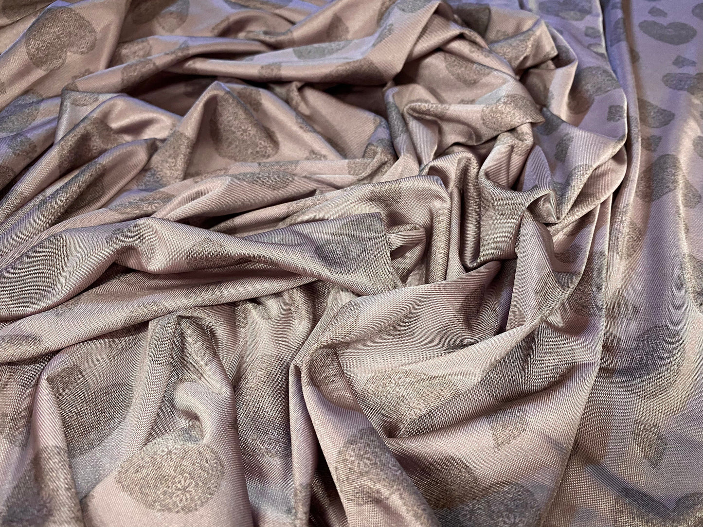 Disco shimmer stretch jersey fabric, per metre - lilac with grey love heart print