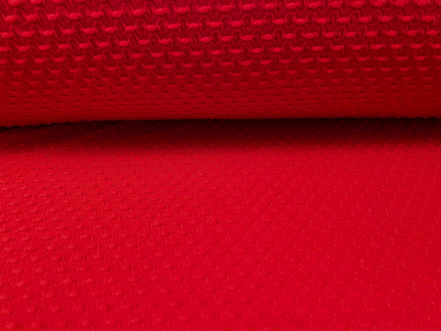 Double jersey stretch fabric with dobby jacquard, per metre - Red