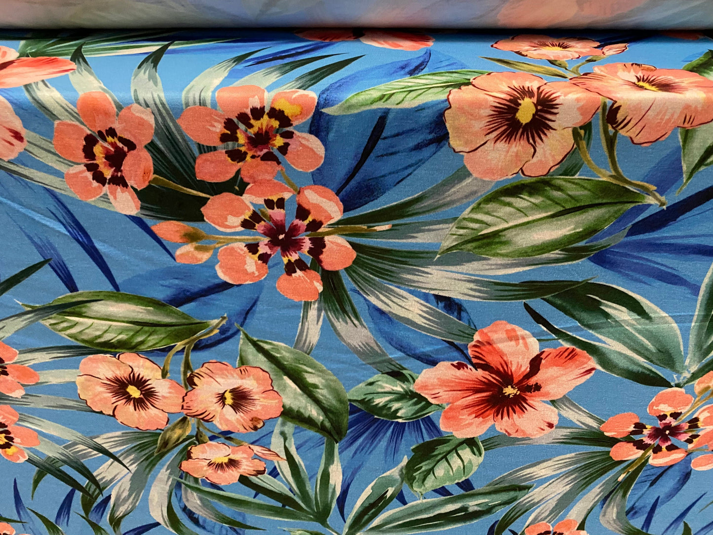 Soft handle stretch jersey fabric, per metre - blue with pink orchid print
