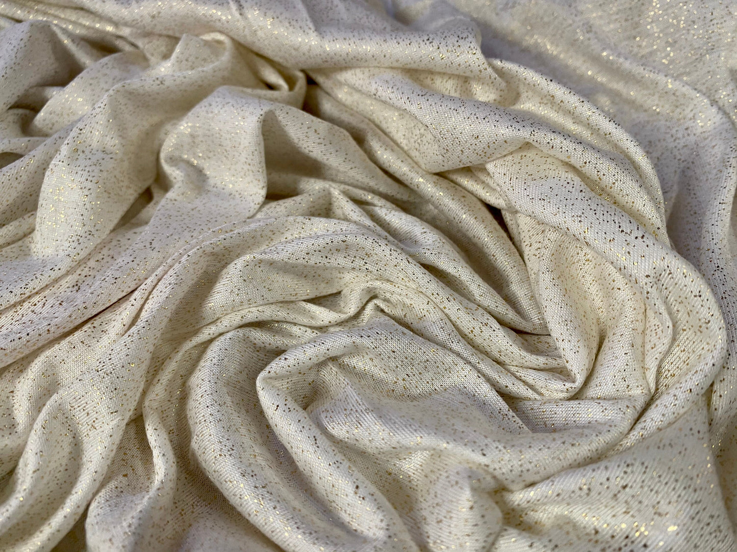 Viscose single jersey fabric with gold metallic speckle, per metre - Cream