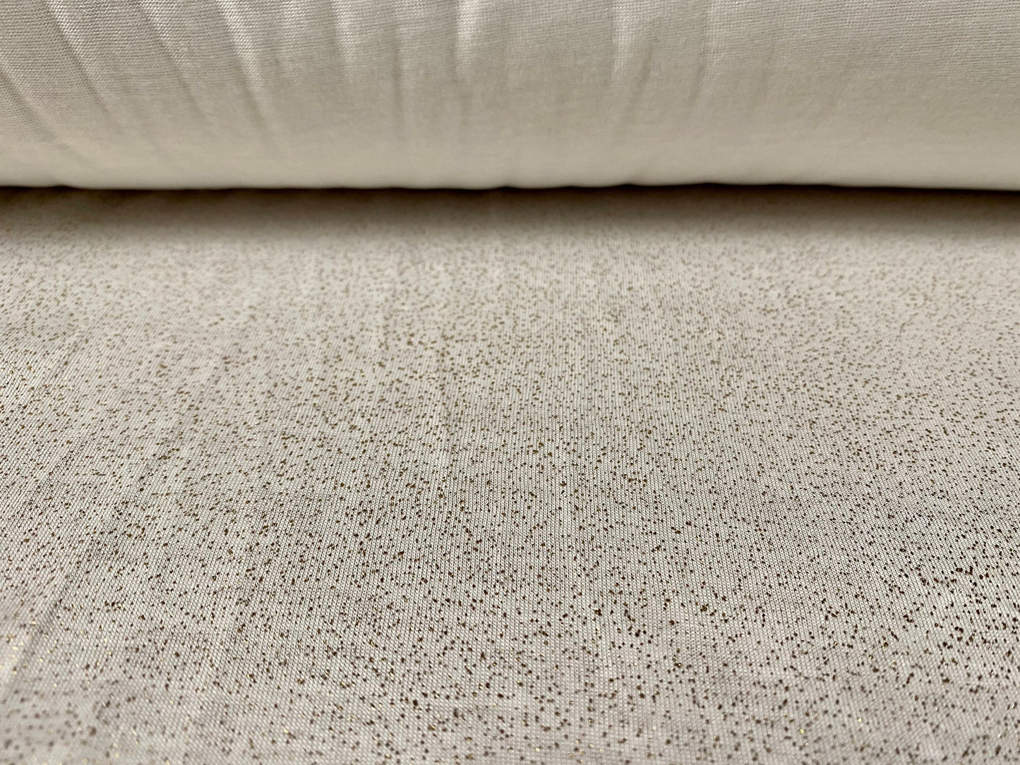 Viscose single jersey fabric with gold metallic speckle, per metre - Cream