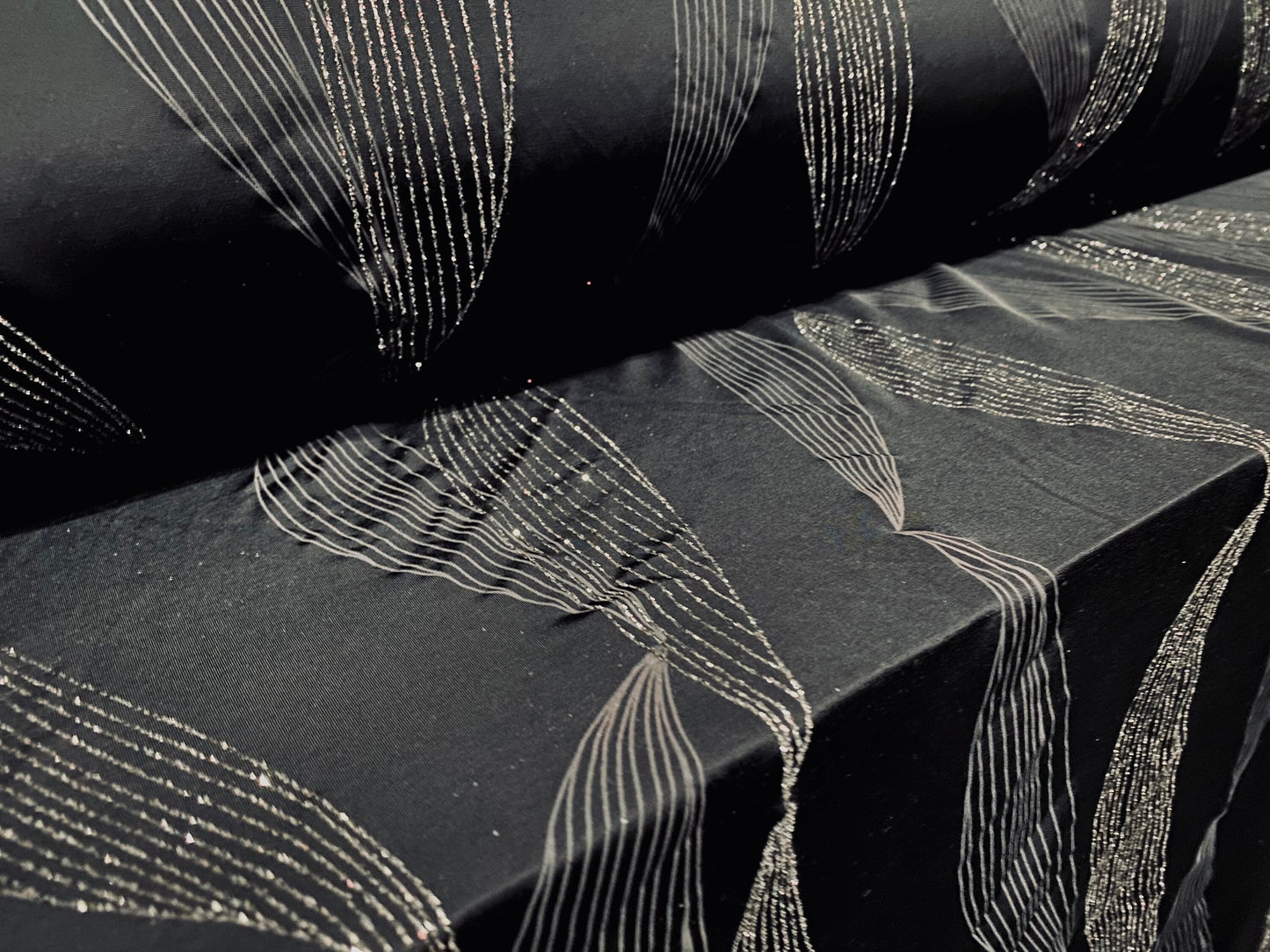 Spandex stretch jersey fabric, per metre - black with silver glitter swirl print