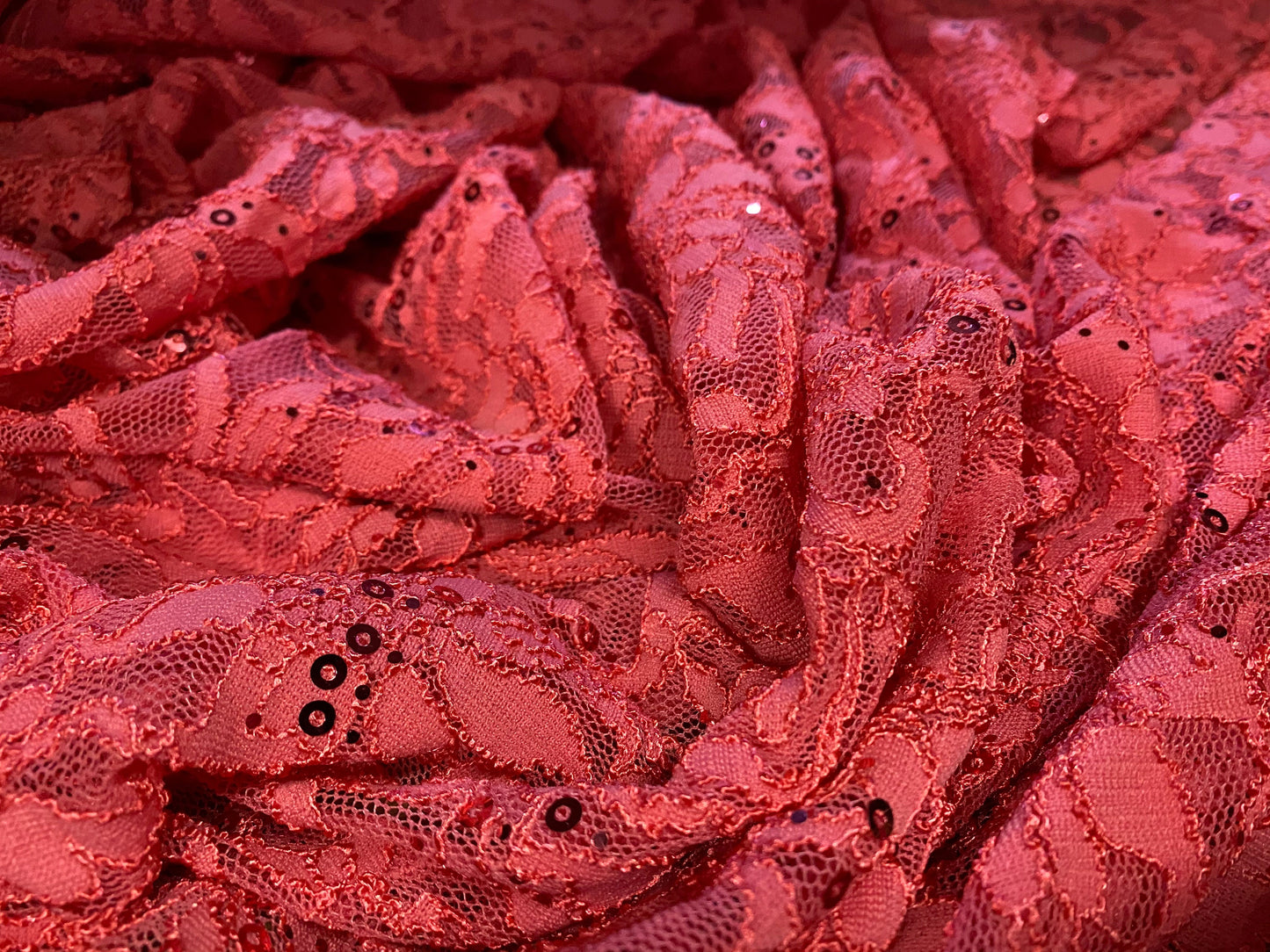 Stretch lace dress fabric with sequins, per metre - coral