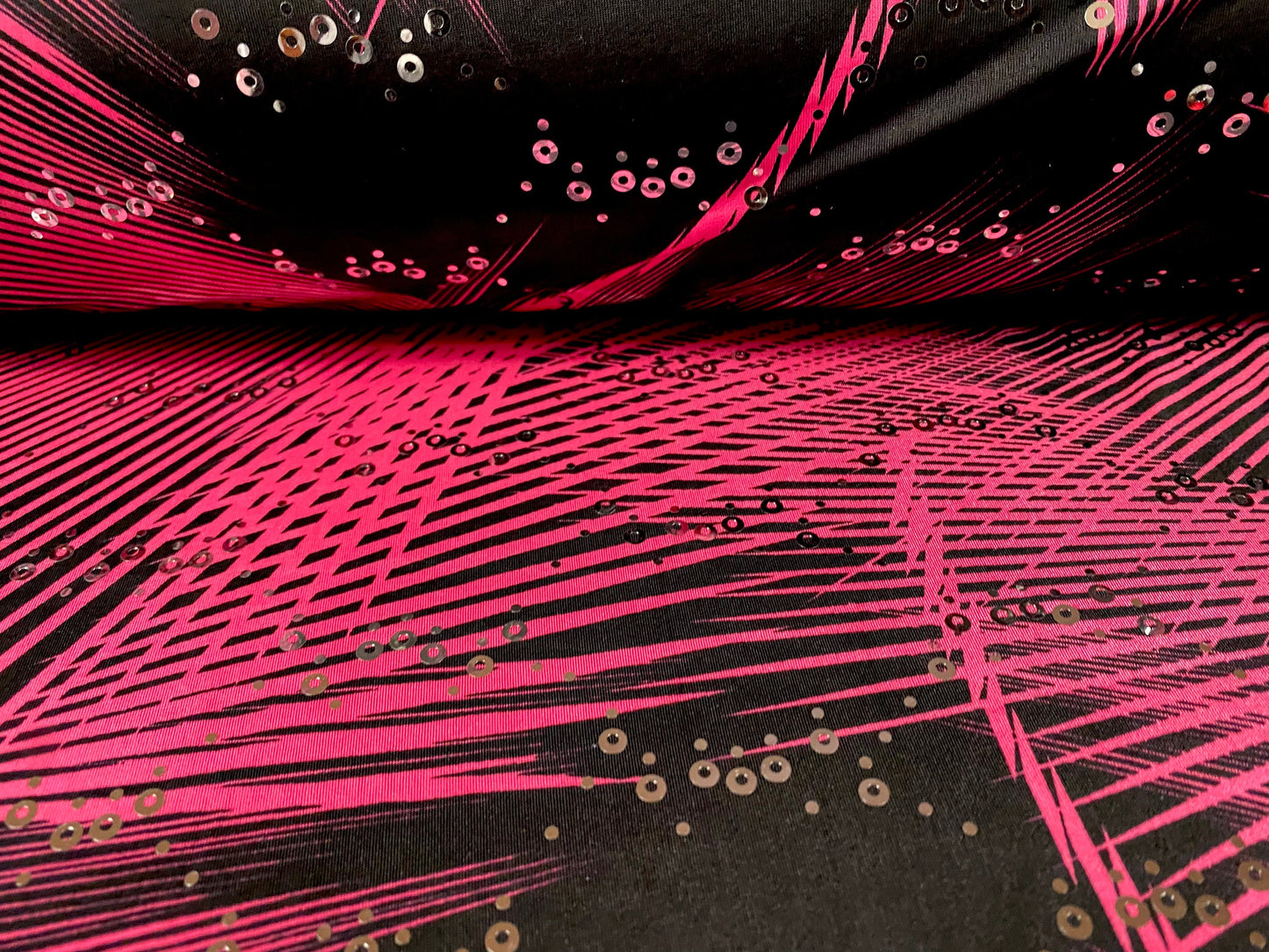 Spandex stretch ITY jersey fabric, per metre - black and cerise psychedelic print with sequins
