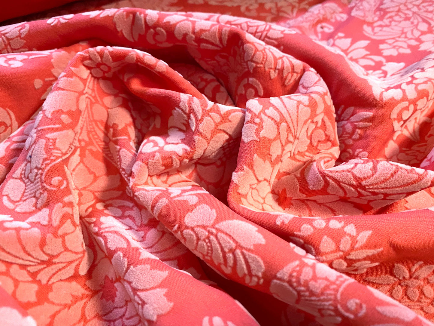 Double jersey stretch fabric, per metre - flocked flour de lys print - coral