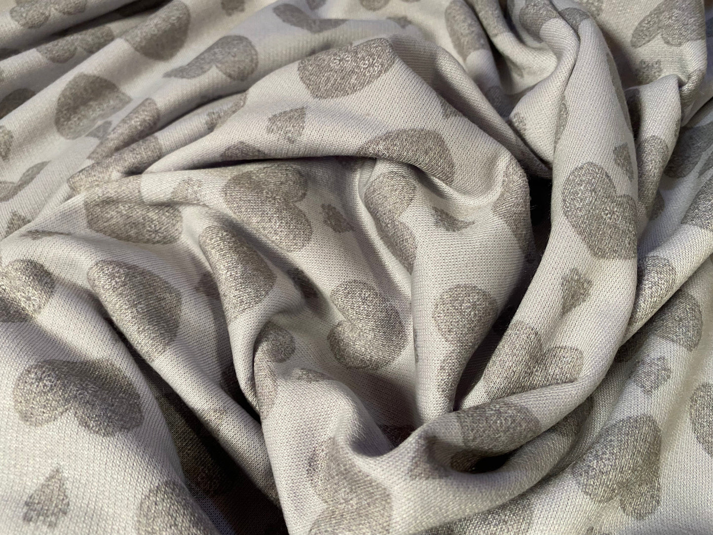 Sweatshirt fleece soft jersey fabric, per metre - pale lilac with grey love hearts print