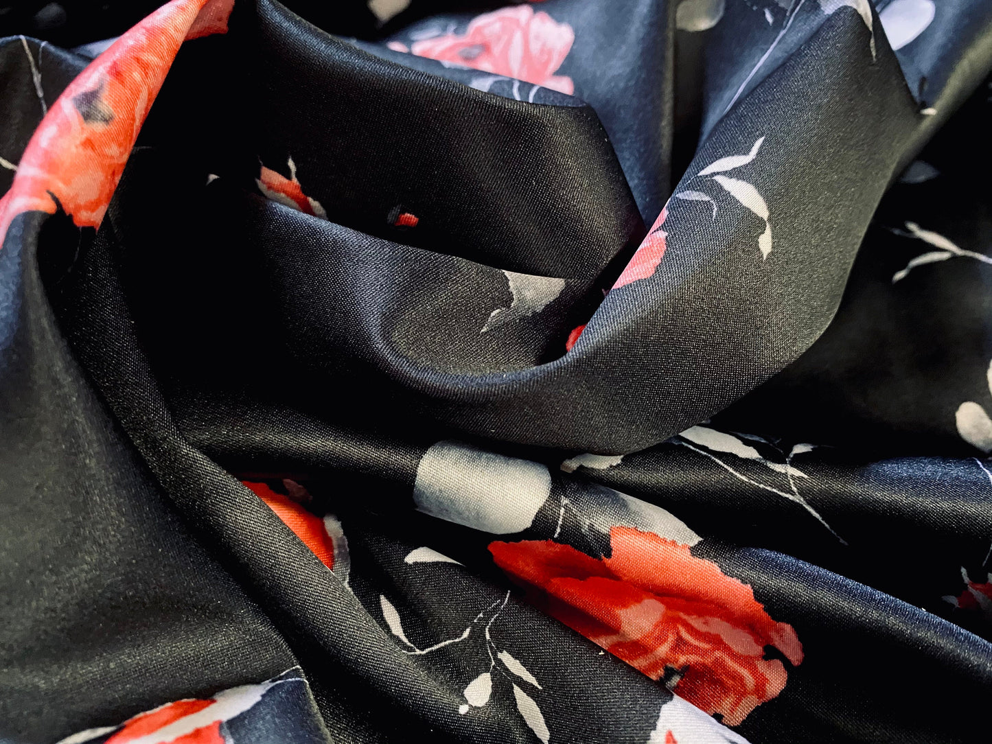 Stretch sateen woven dress fabric, per metre - black with pink rose print