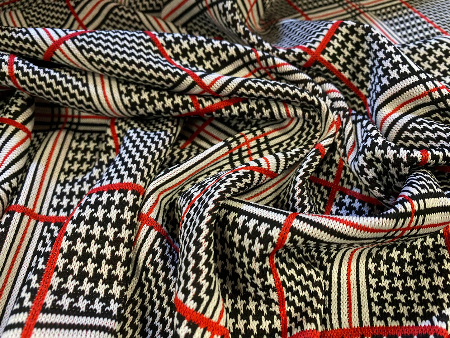 Double jersey stretch fabric with engineered dogtooth check, per metre - black & Red