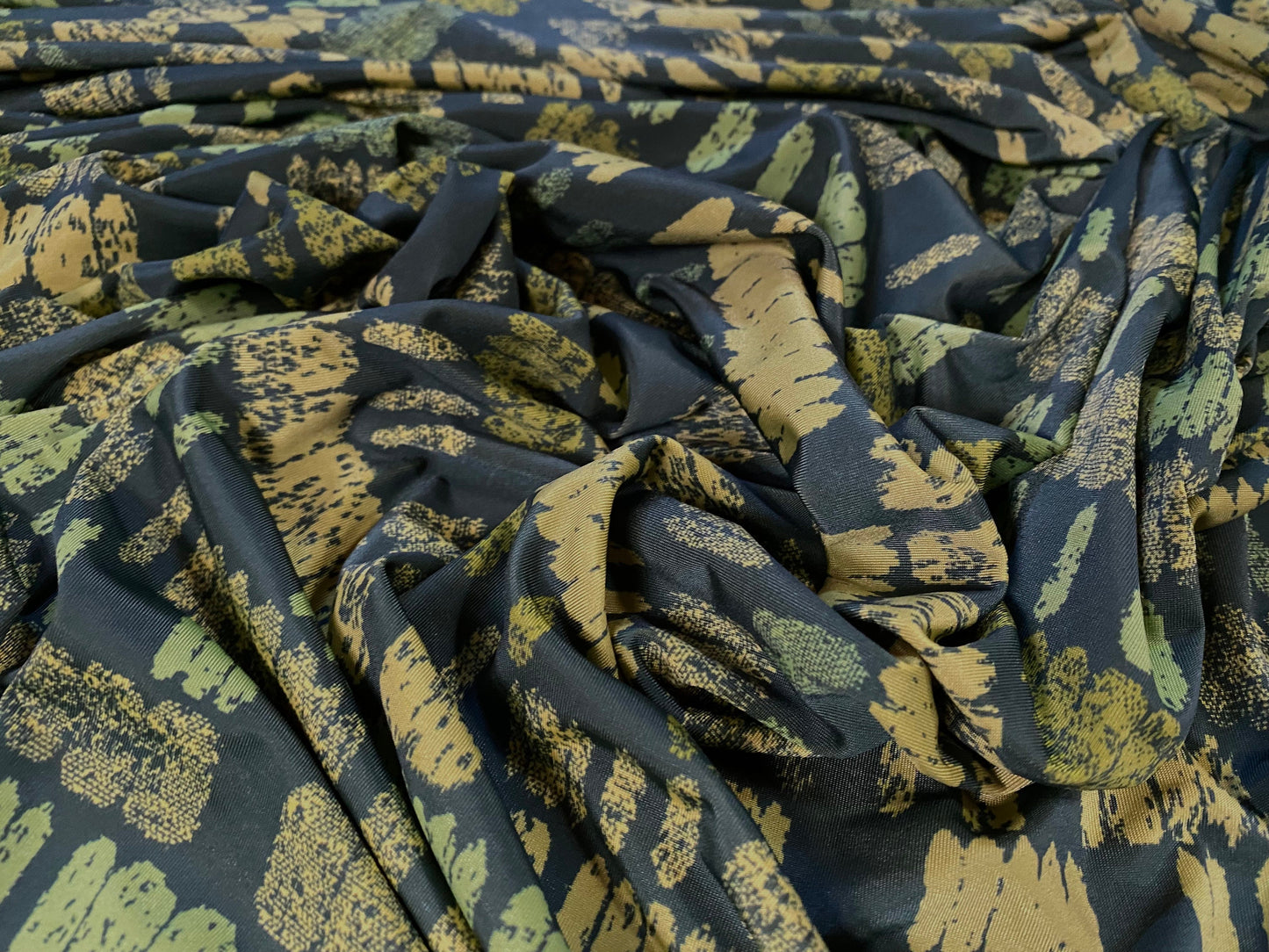 Disco shimmer stretch jersey fabric, per metre - geometric print - blue green