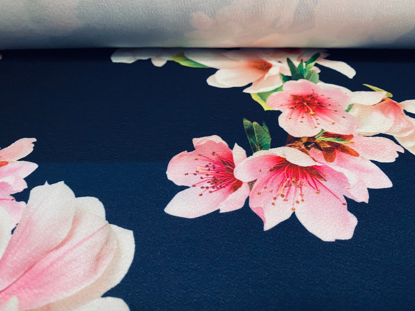 Scuba textured ‘Liverpool’ stretch spandex jersey fabric, per metre - Navy with pink blossom print