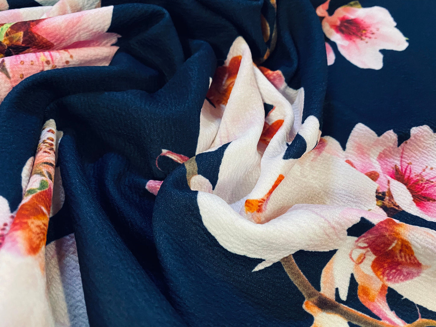 Scuba textured ‘Liverpool’ stretch spandex jersey fabric, per metre - Navy with pink blossom print