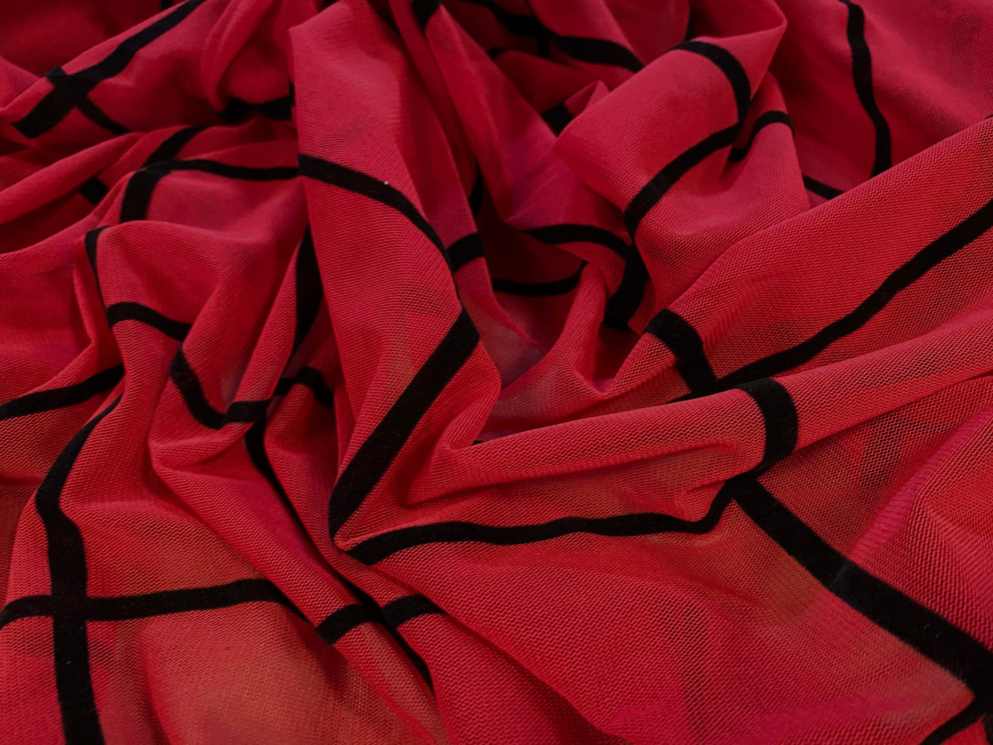 Red power mesh net stretch fabric with flocked squares design, per metre