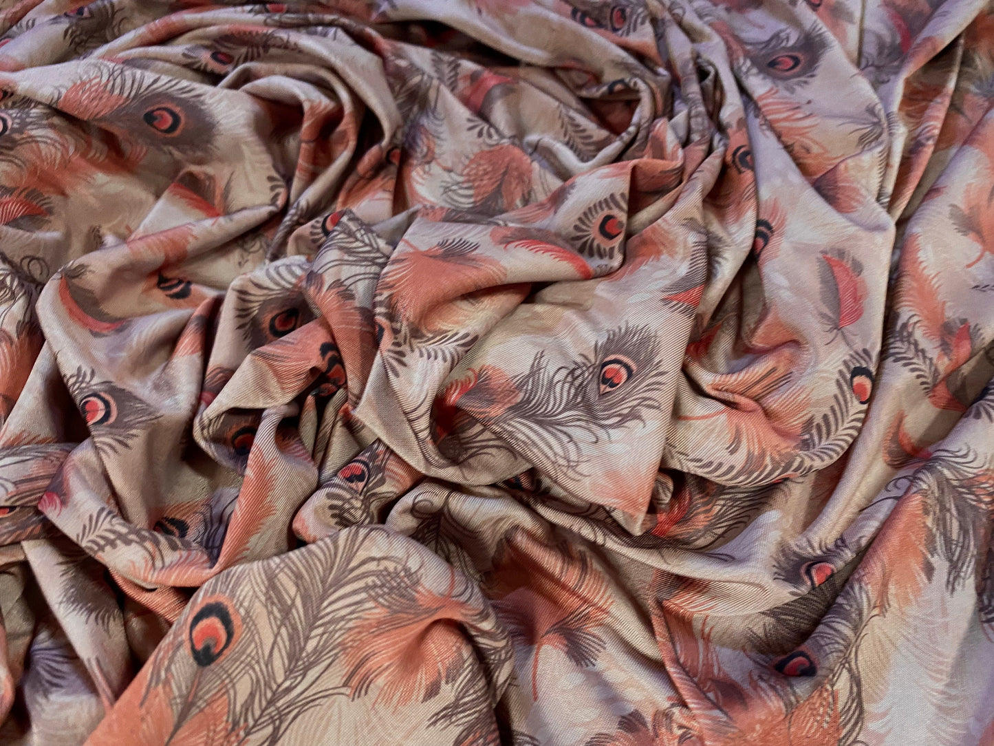 Disco shimmer stretch jersey fabric, per metre - peacock feathers print - dusky pink