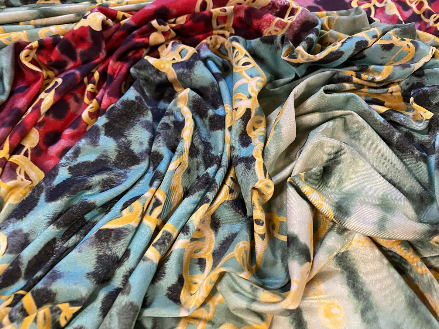 Disco shimmer stretch jersey fabric, per metre - designer chains and Leopardskin print - turquoise