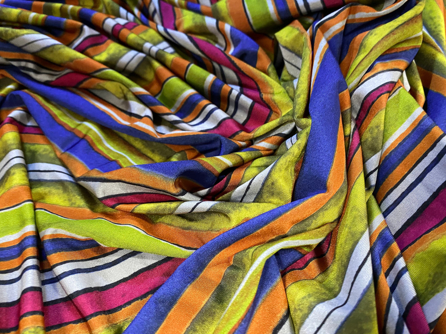 Disco shimmer stretch jersey fabric, per metre - distressed stripe print - multicolour
