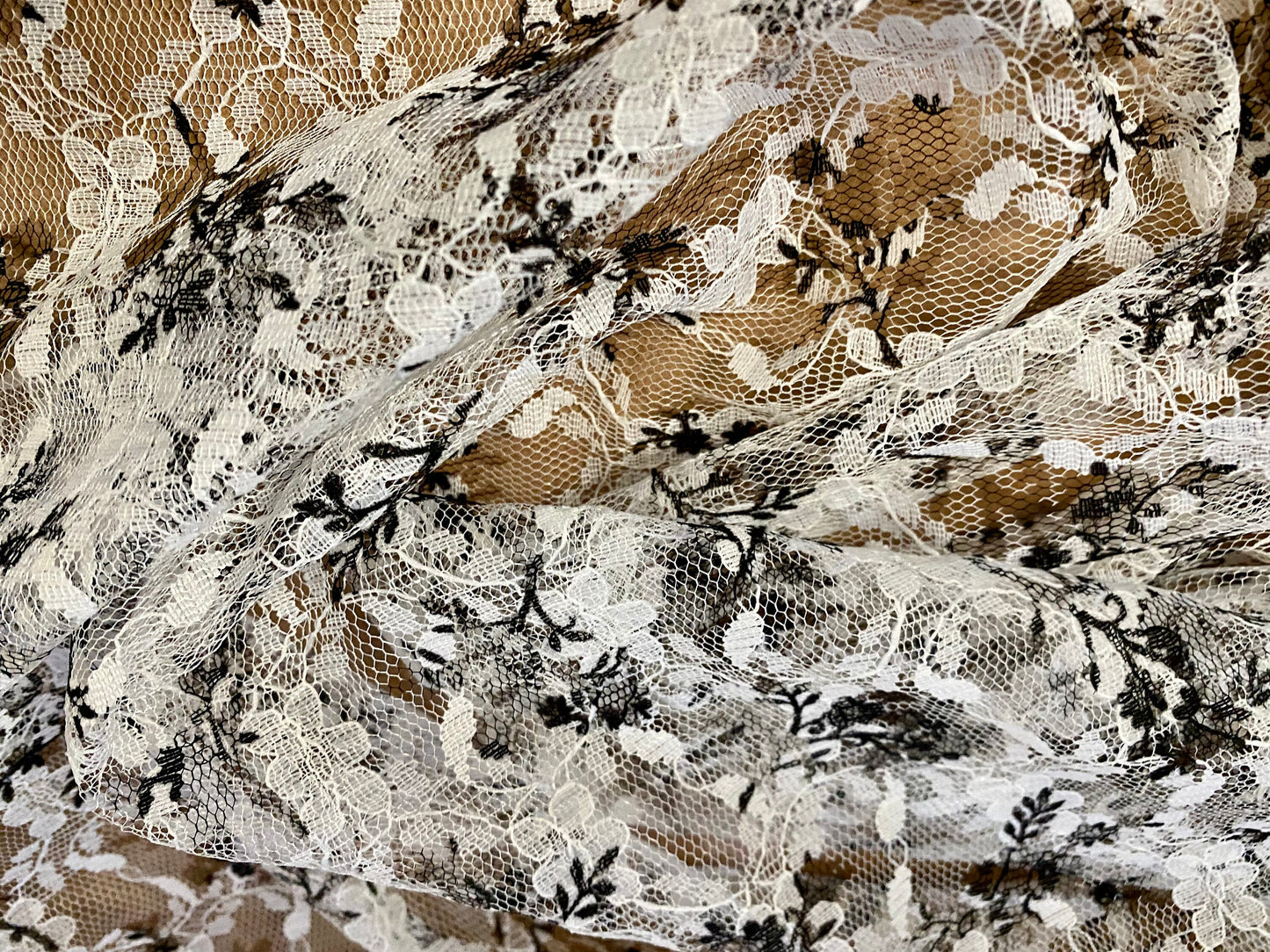 Floral printed lace net dress fabric, per metre - white with black flower