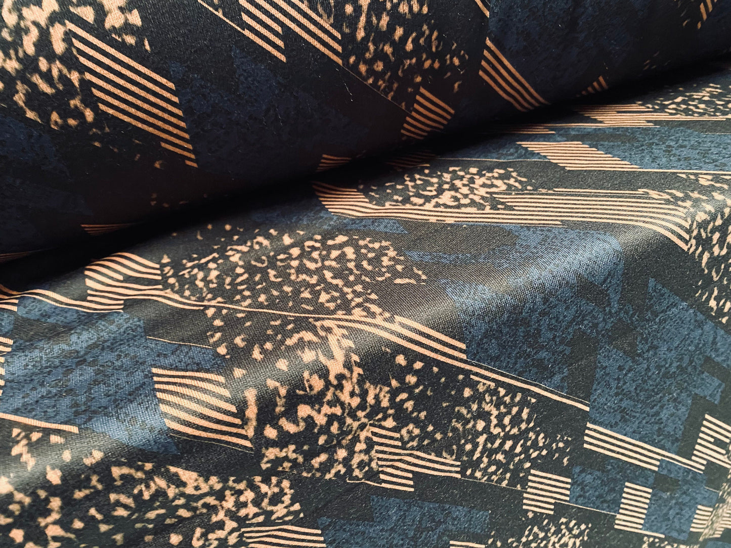 Sweatshirt fleece soft jersey fabric, per metre - Siena brown with blue black 80s retro print