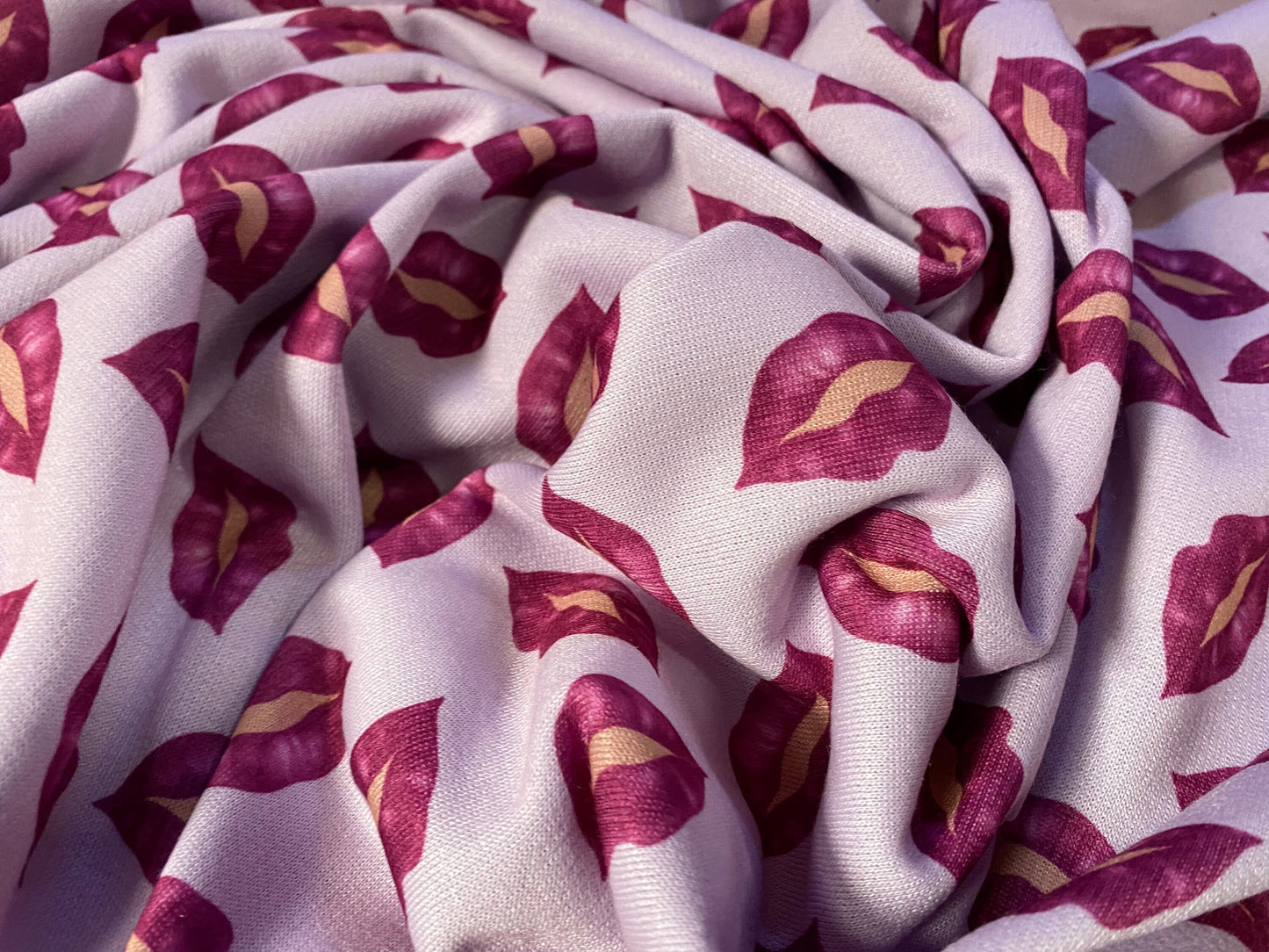 Sweatshirt fleece soft jersey fabric, per metre - lilac with magenta lipstick print