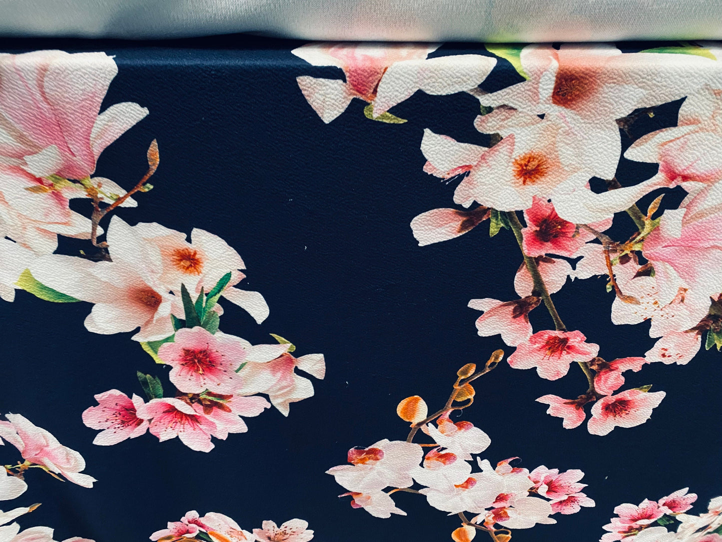 Scuba textured ‘Liverpool’ stretch spandex jersey fabric, per metre - Navy with pink blossom print
