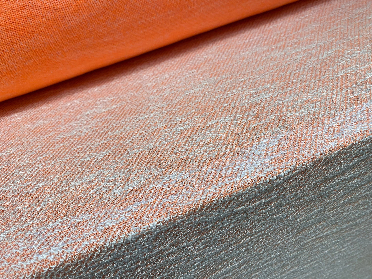 Melange double jersey fabric with looped face, per metre - Orange