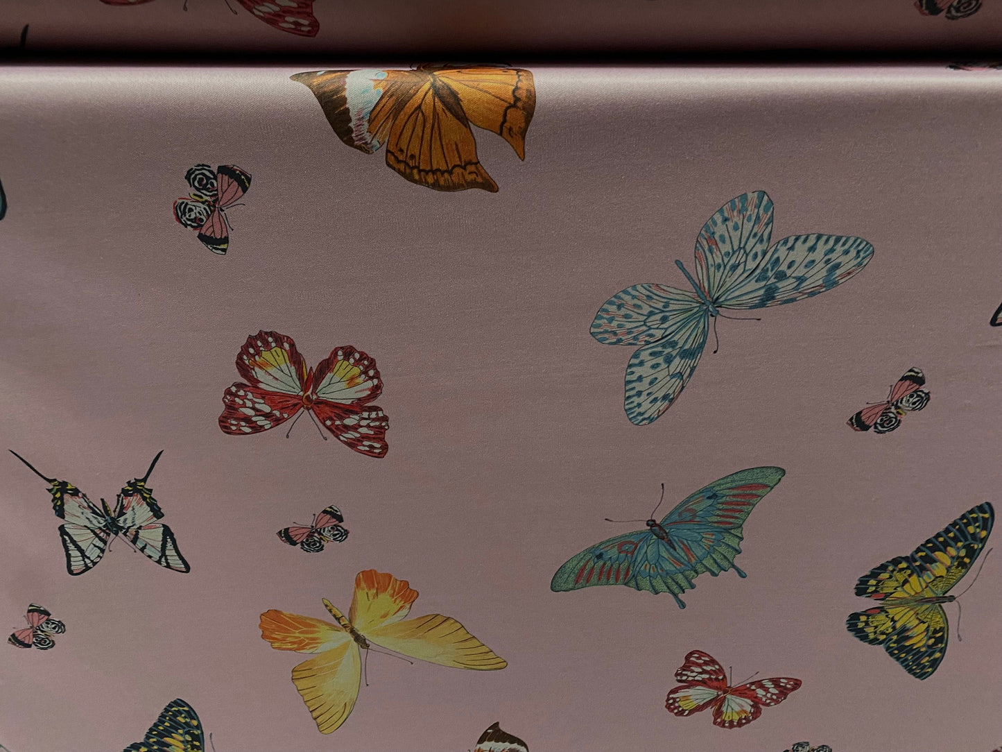 Single jersey polyester fabric - 60 inches wide - butterfly print - dusky mauve