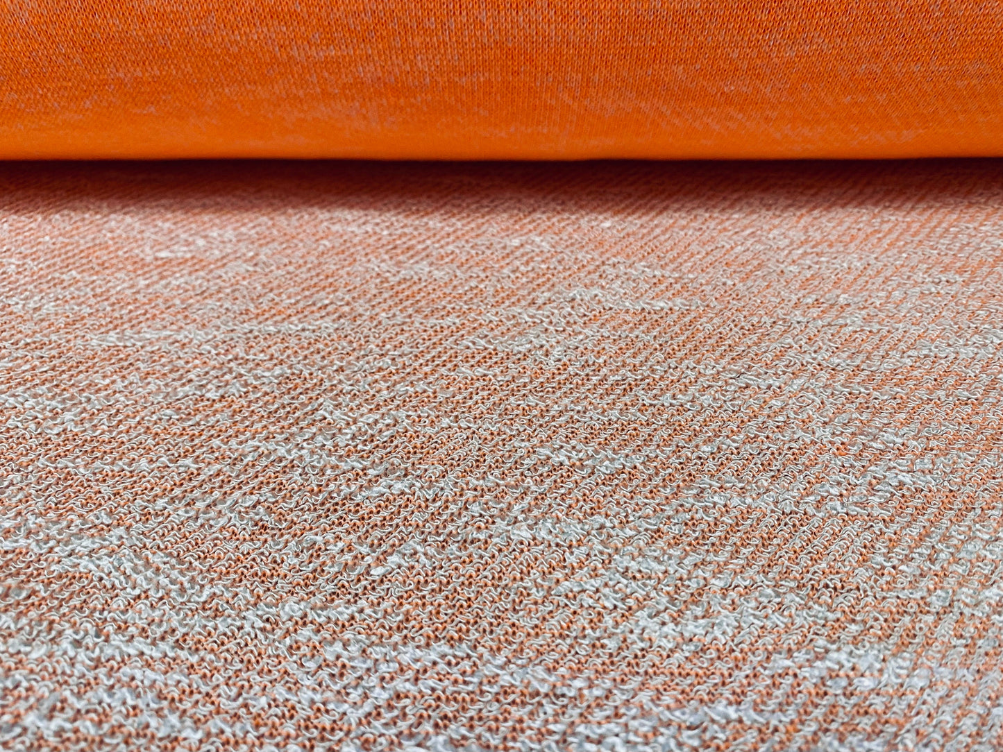 Melange double jersey fabric with looped face, per metre - Orange
