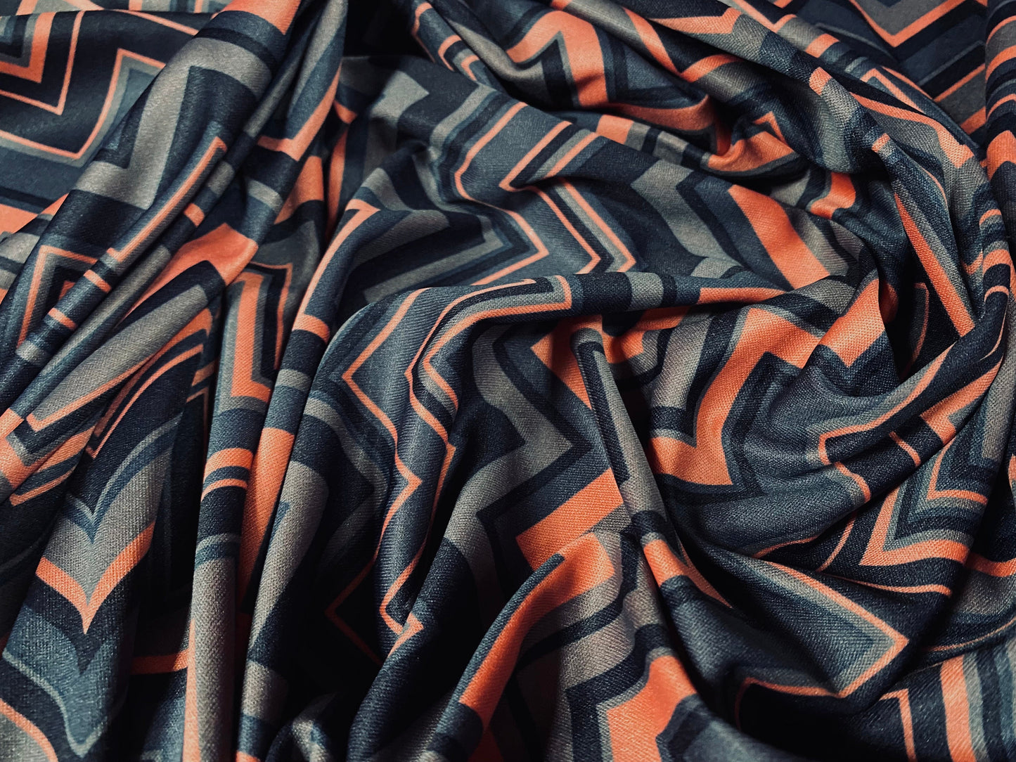 Single jersey polyester fabric - 60 inches wide - chevron zigzag print - pink & steel blue
