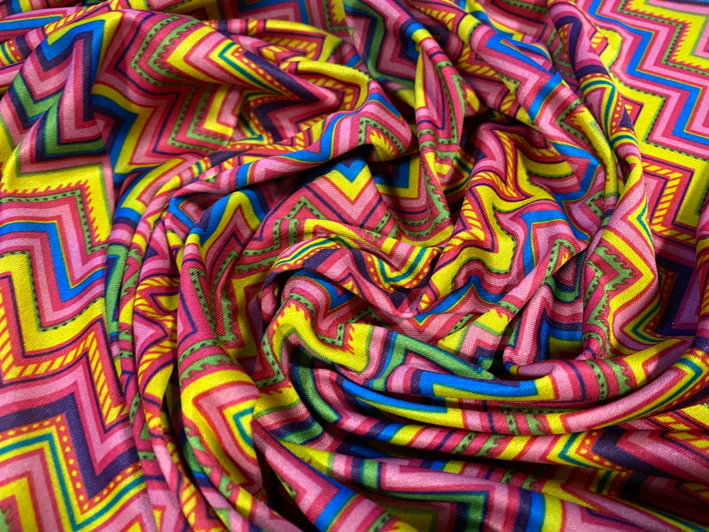 Single jersey polyester fabric - 60 inches wide - tutti frutti zigzag print - yellow & pink