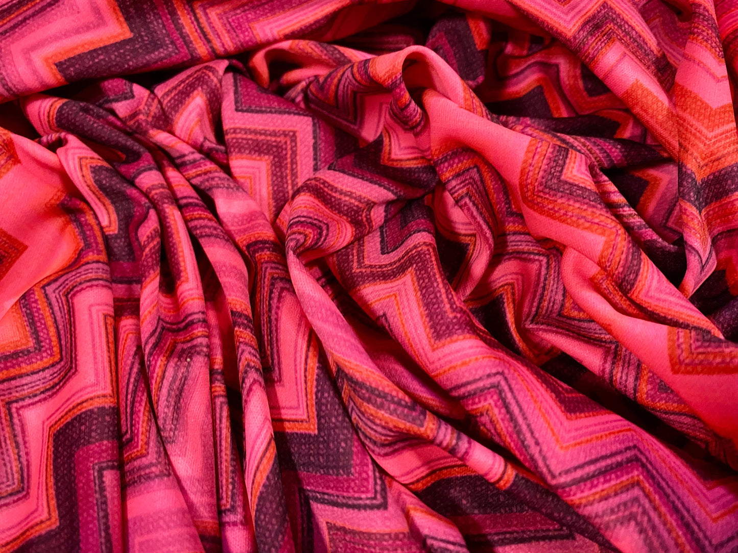 Single jersey polyester fabric - 60 inches wide - chevron zigzag print - fluorescent pink