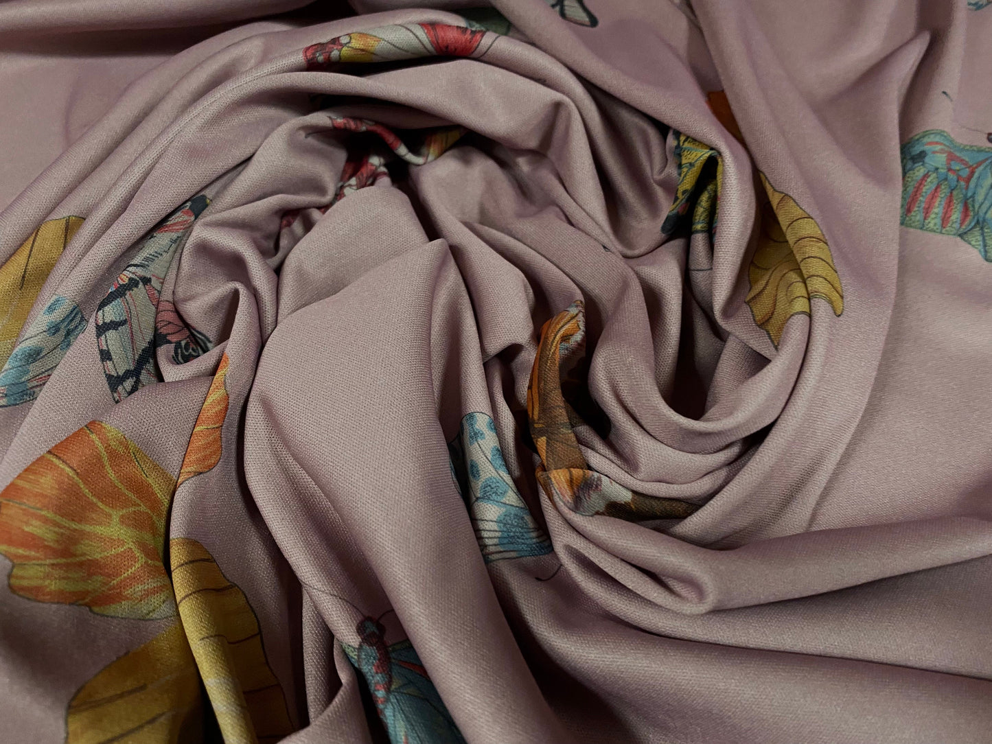 Single jersey polyester fabric - 60 inches wide - butterfly print - dusky mauve