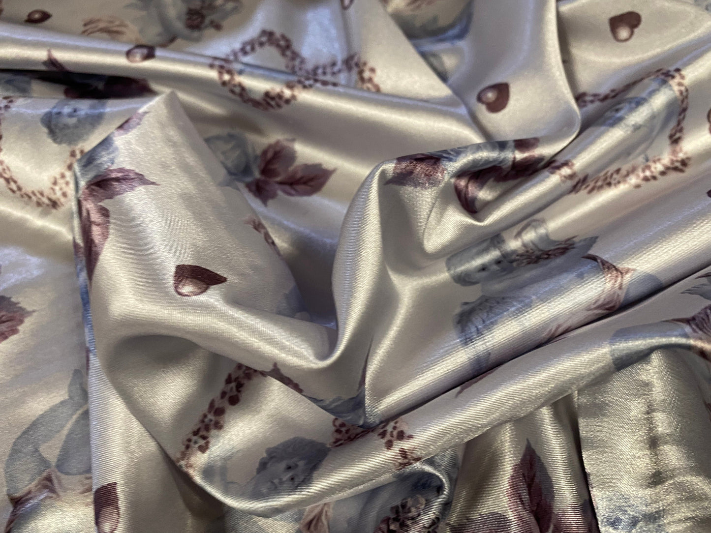 Silky Stretch charmeuse satin dress fabric, per metre - Cupid in a love heart print - silver blue