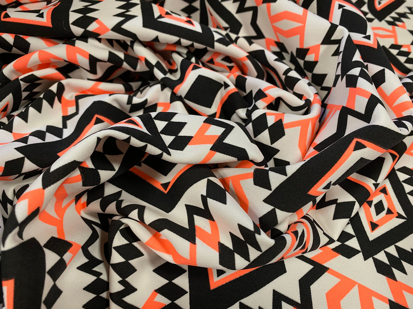 Scuba spandex stretch neoprene style jersey fashion fabric, per metre - Inca Aztec print - fluorescent pink & black