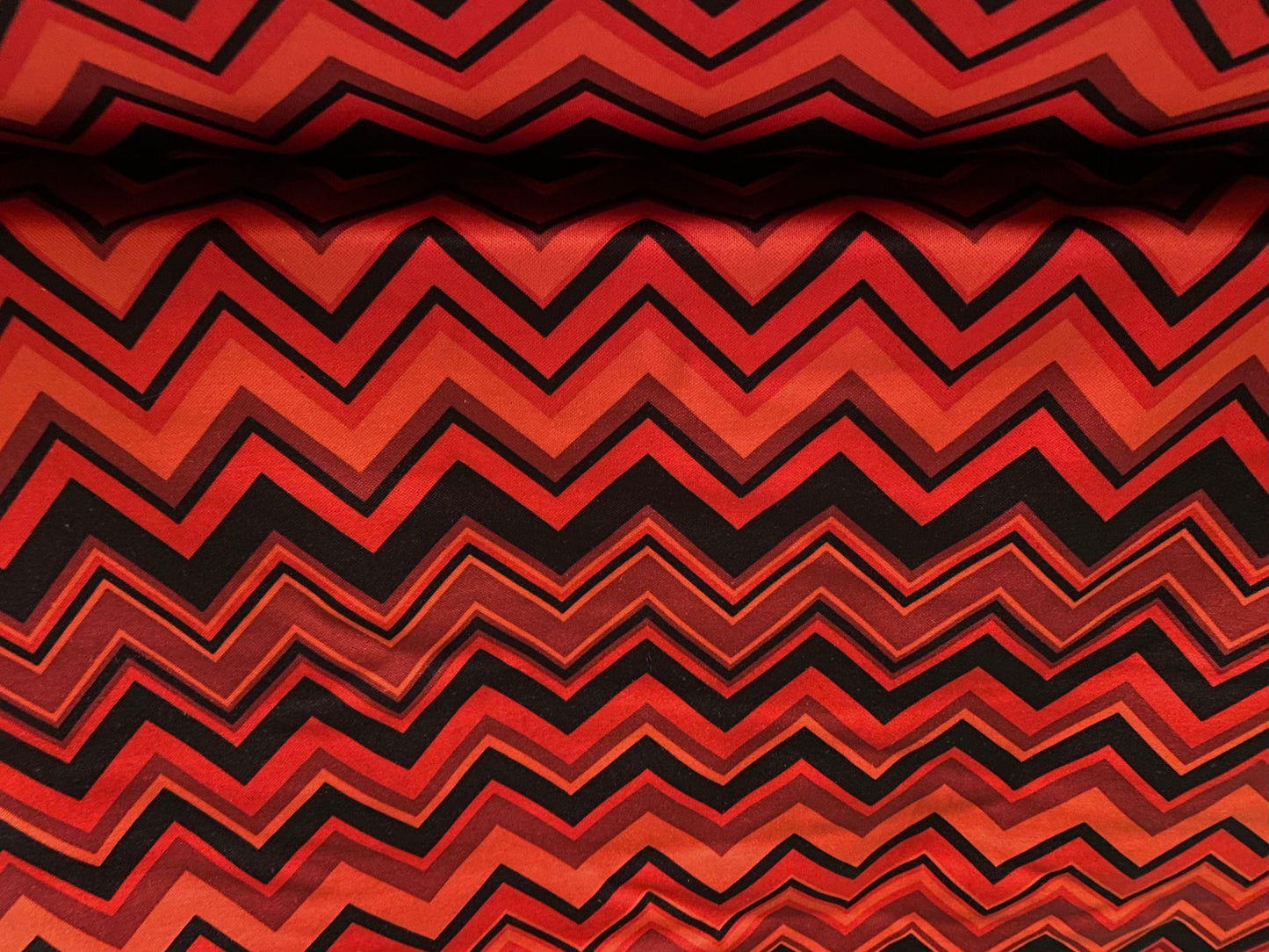 Scuba spandex stretch neoprene style jersey fashion fabric, per metre - Chevron print - dark orange & black