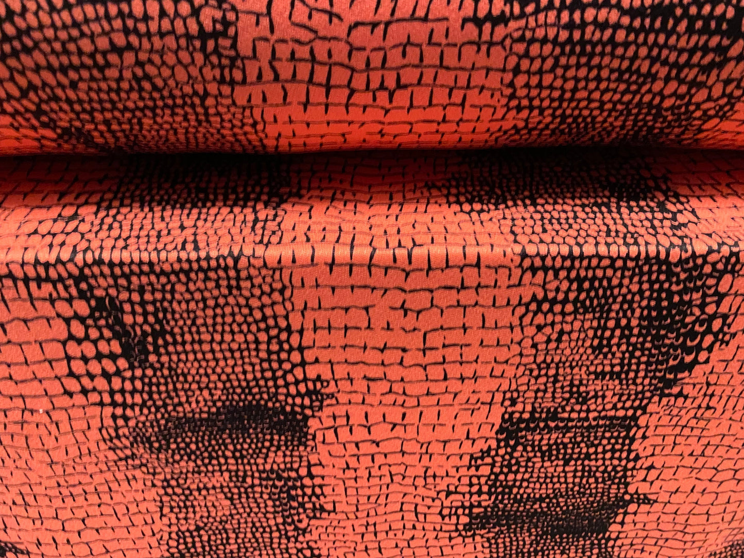 Stretch Spandex crepe single jersey fabric - distressed alligator print - coral