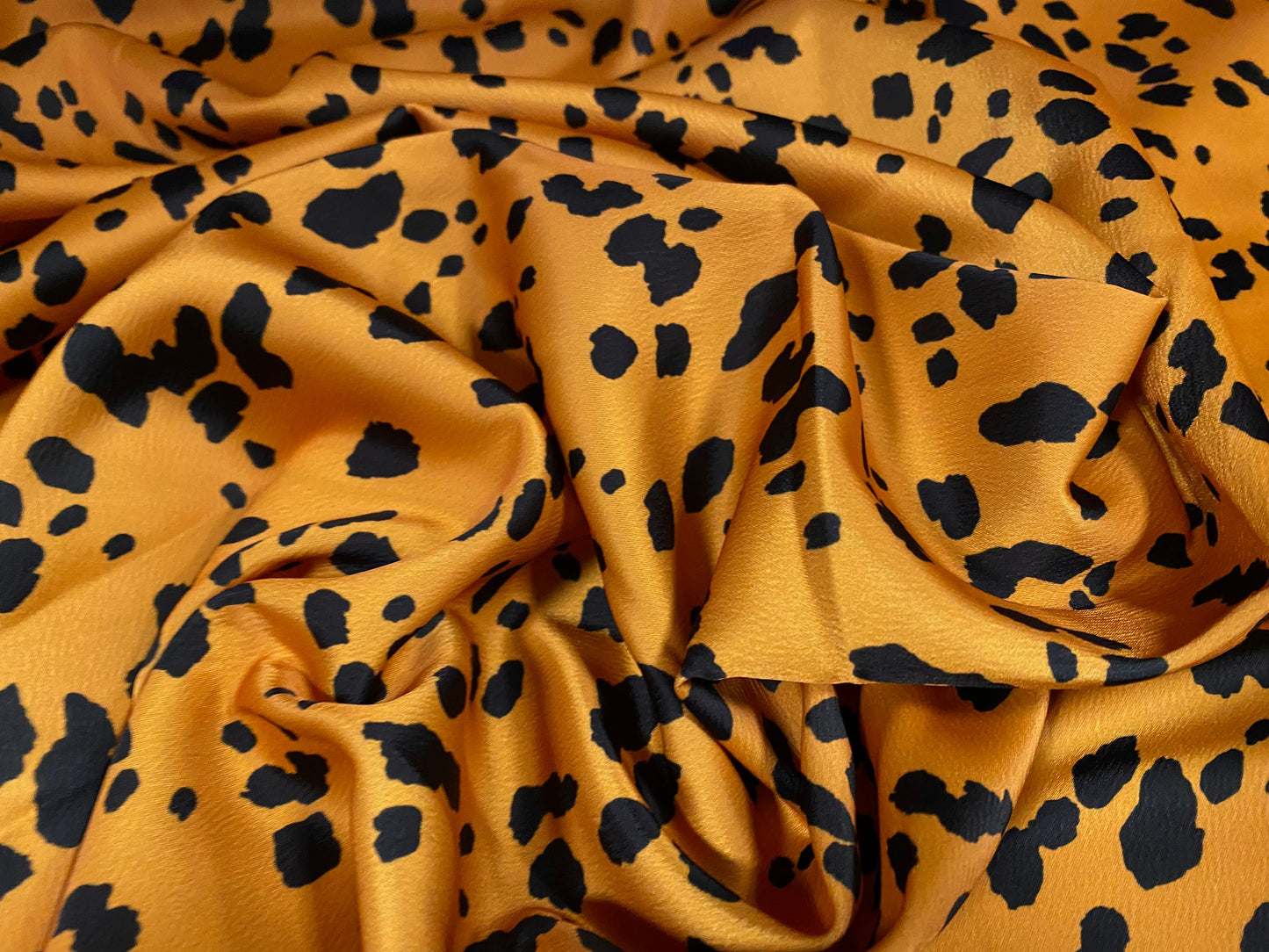 Stretch sateen woven dress fabric, per metre - Dalmatian print - honey & black