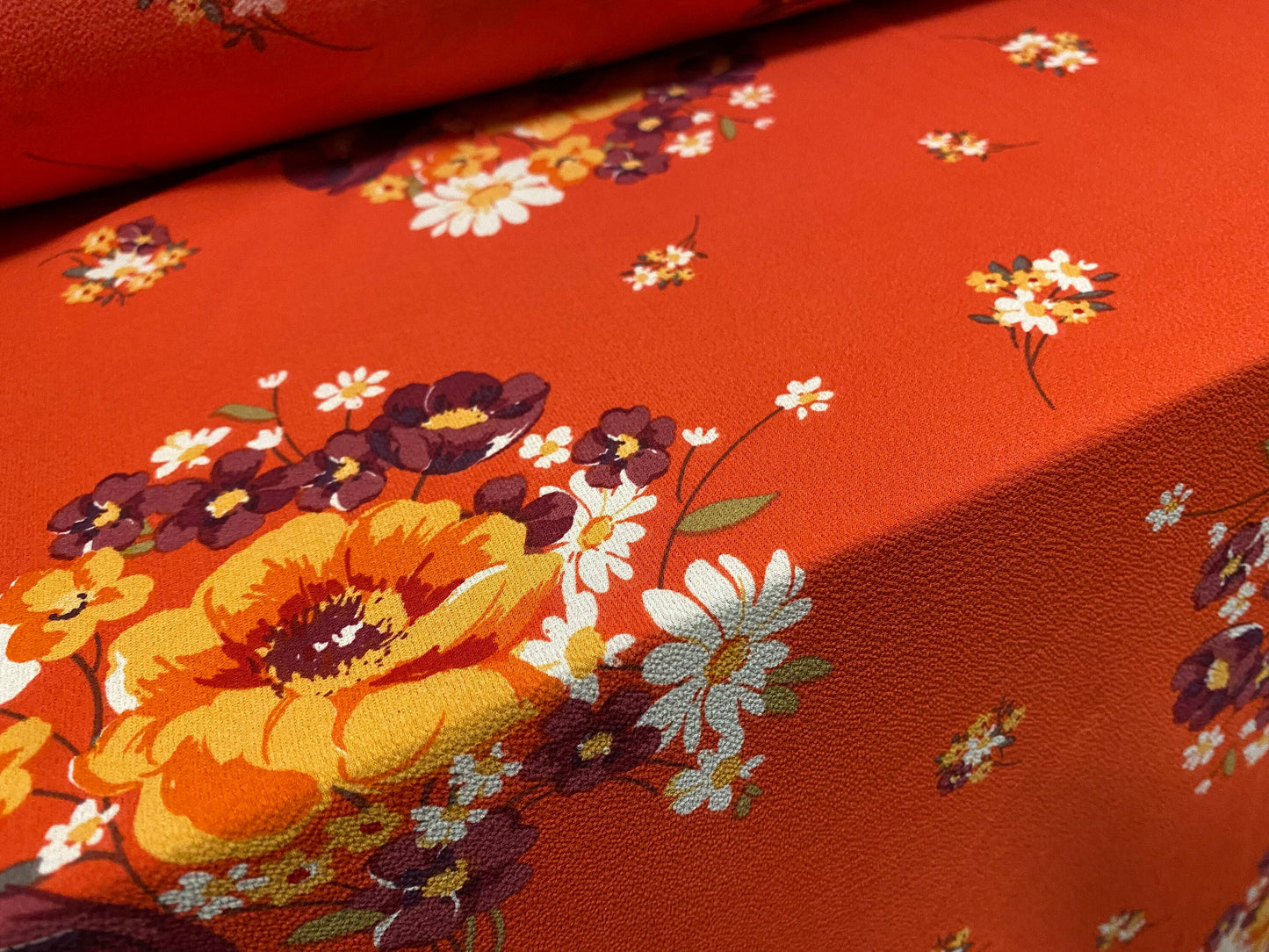Stretch spandex crepe woven dress fabric, per metre - flower bouquet print - blood Orange
