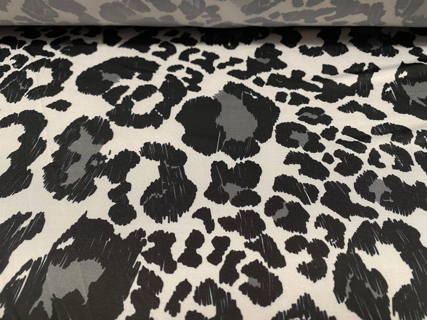 Soft touch stretch spandex jersey fabric, per metre - leopard skin animal print - grey