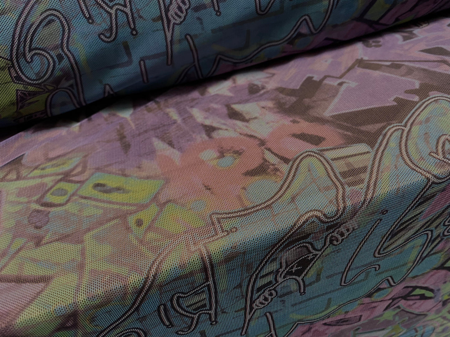 Power mesh net stretch spandex fabric, sheer, per metre - street art graffiti print - pink & blue