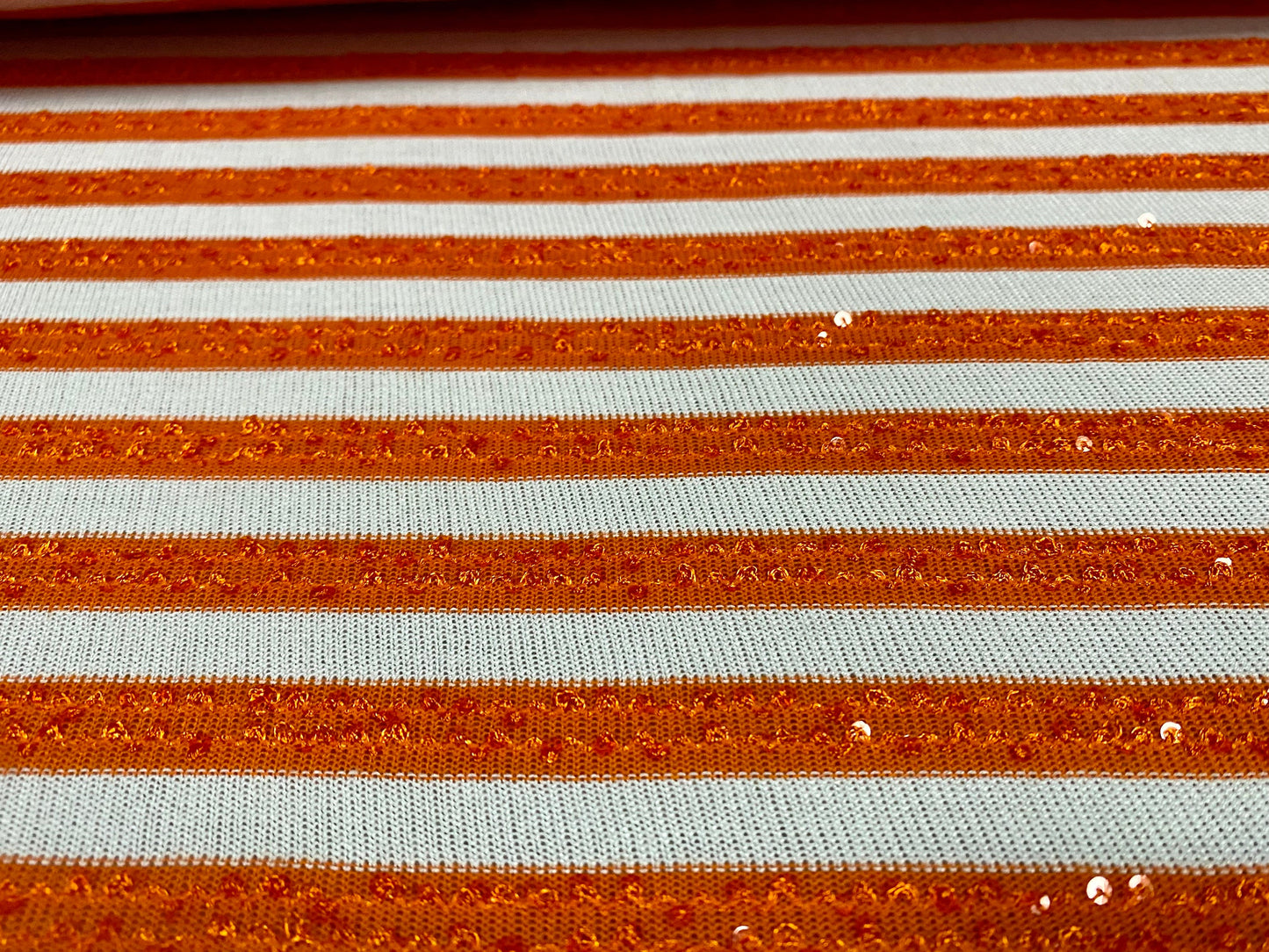 Sequin sparkle stripe jersey knit fabric, per metre - orange & white