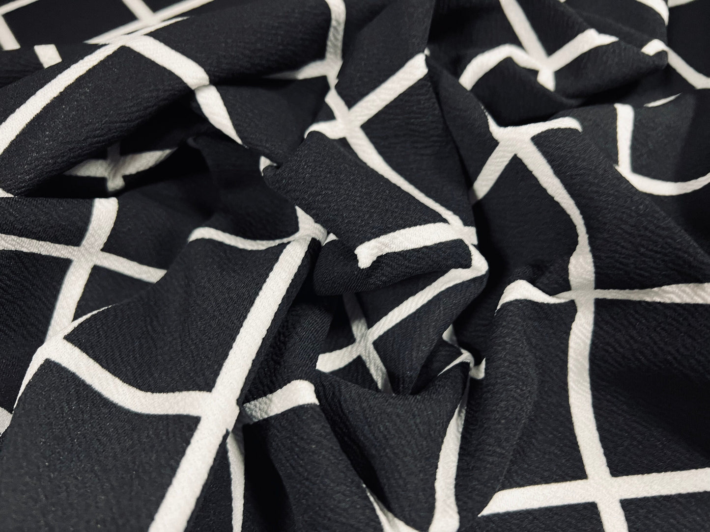 Scuba textured ‘Liverpool’ stretch spandex jersey fabric, per metre - matrix check print - black