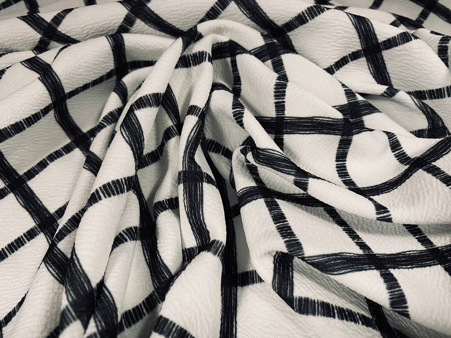 Scuba textured ‘Liverpool’ stretch spandex jersey fabric, per metre - matrix check print - white & black