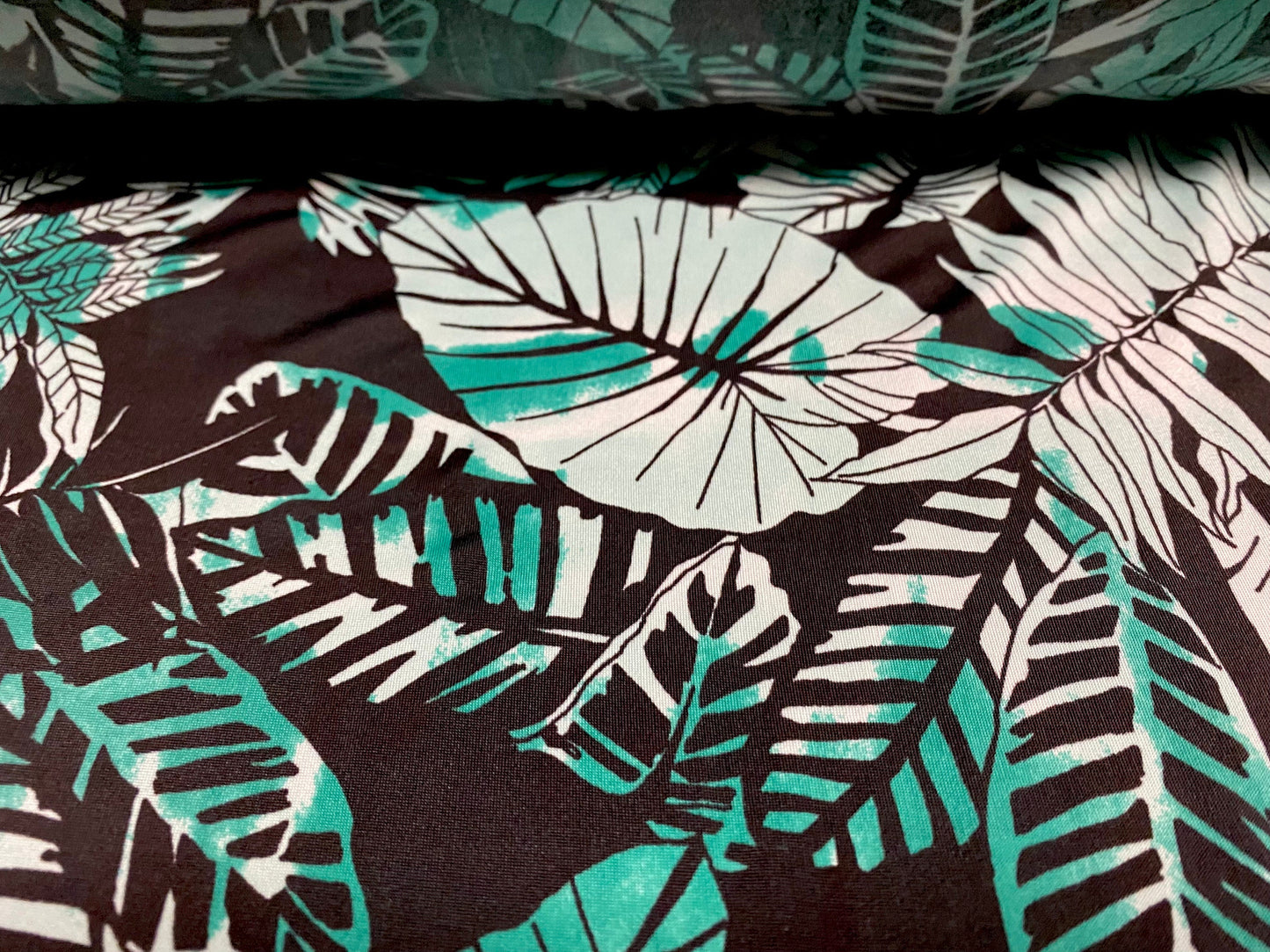 Spandex stretch ITY single jersey fabric, per metre - leaf print - black & green
