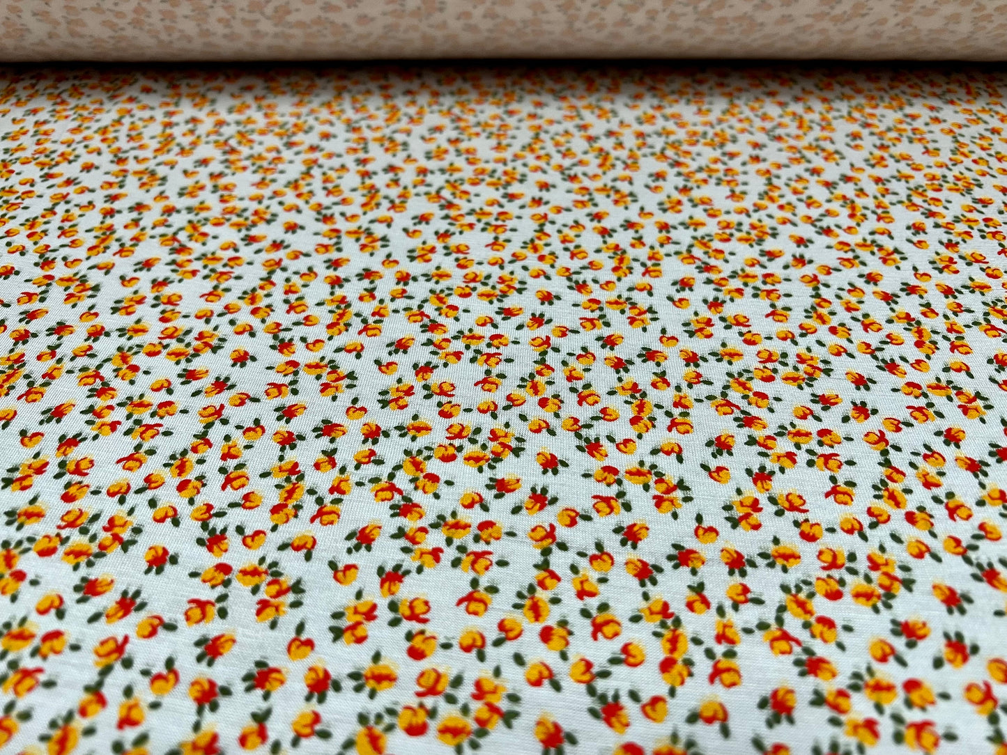 Viscose spandex stretch jersey fabric, per metre - small ditsy flower print - white & orange